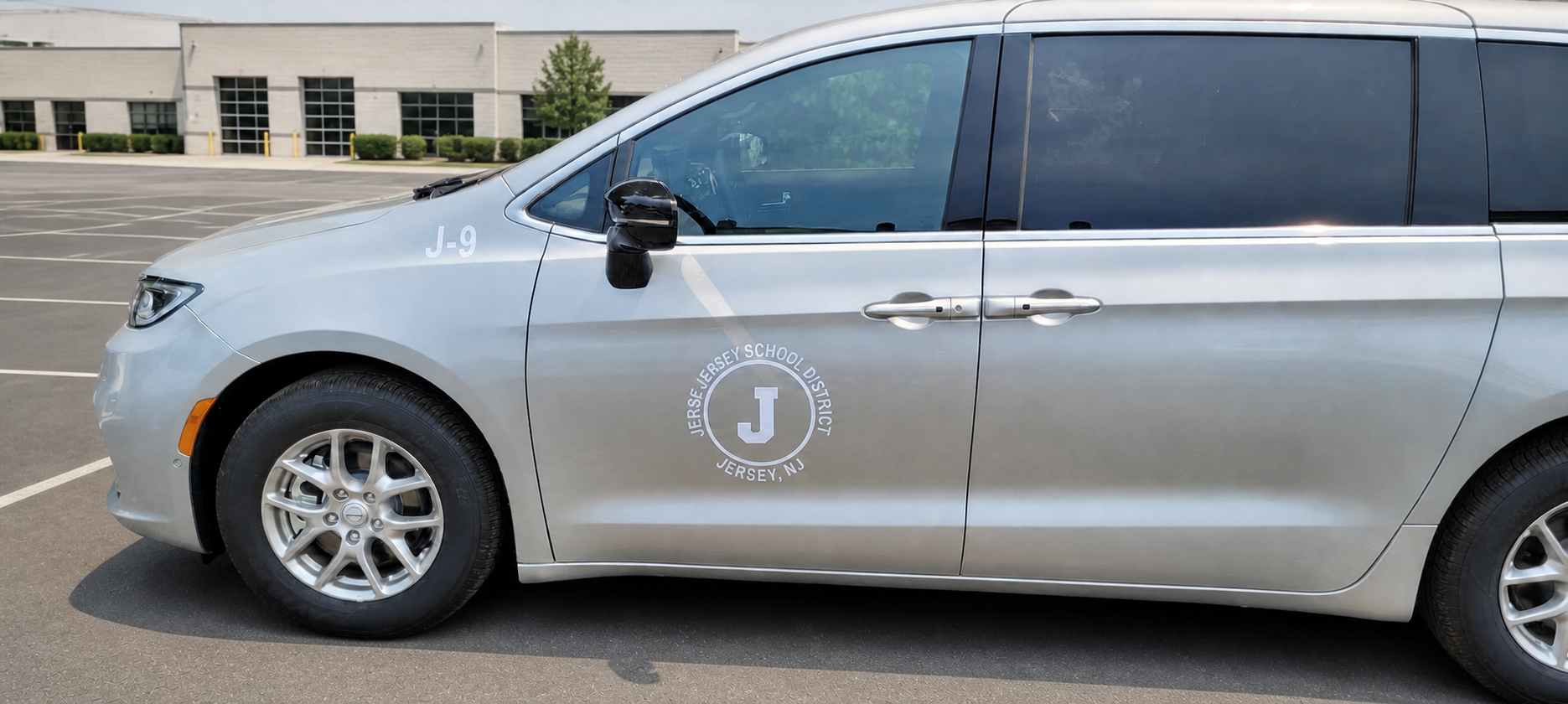 Lettered passenger fleet vehicle shown in full